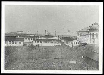 Newly-built temporary structures at American University next to completed McKinley Hall on campus. (Source: American University Archives) Newly-built temporary structures at American University next to completed McKinley Hall on campus. (Source: American University Archives)