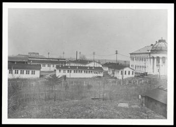 Newly-built temporary structures at American University next to completed McKinley Hall on campus. (Source: American University Archives)