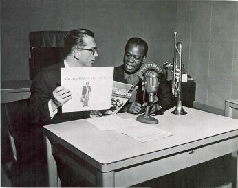 Willis Conover interviews Louis Armstrong for Jazz Hour on the "Music U.S.A." broadcast. Source: Wikimedia Commons