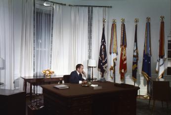 “President Nixon in the Oval Office speaking on the telephone to the Apollo XI astronauts Neil Armstrong and Edwin “Buzz” Aldrin while they were on the Moon, July 20, 1969.” (Photo Source: Richard Nixon Presidential Library and Museum Website (National Archives) https://www.archives.gov/presidential-libraries/events/centennials/nixon/exhibit/nixon-online-exhibit-calls.html