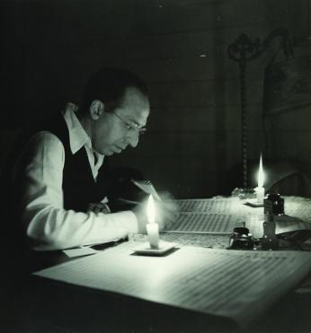 1946 photograph of Aaron Copland in his studio. Victor Kraft, The Aaron Copland Collection, Music Division. <a href=