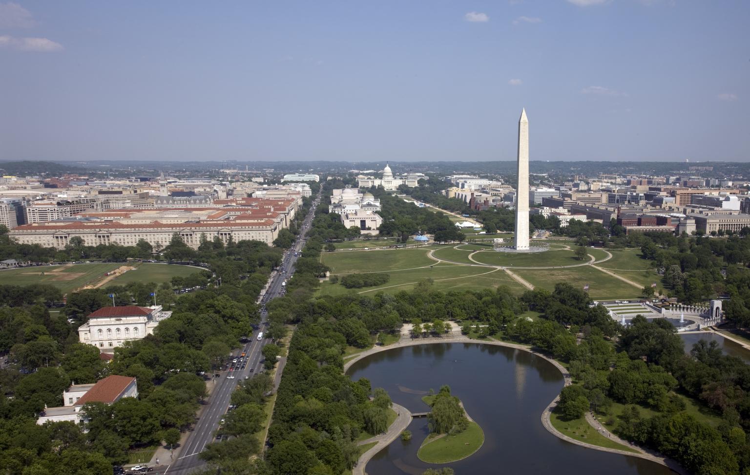 The Washington Mall from behind the Washington Monument, with the museums and other buildings visible in the distance