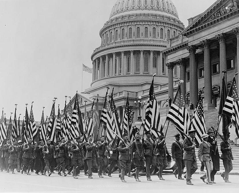Bonus marchers with flags in front of US Capitol in 1932. (Source: LIbrary of Congress)