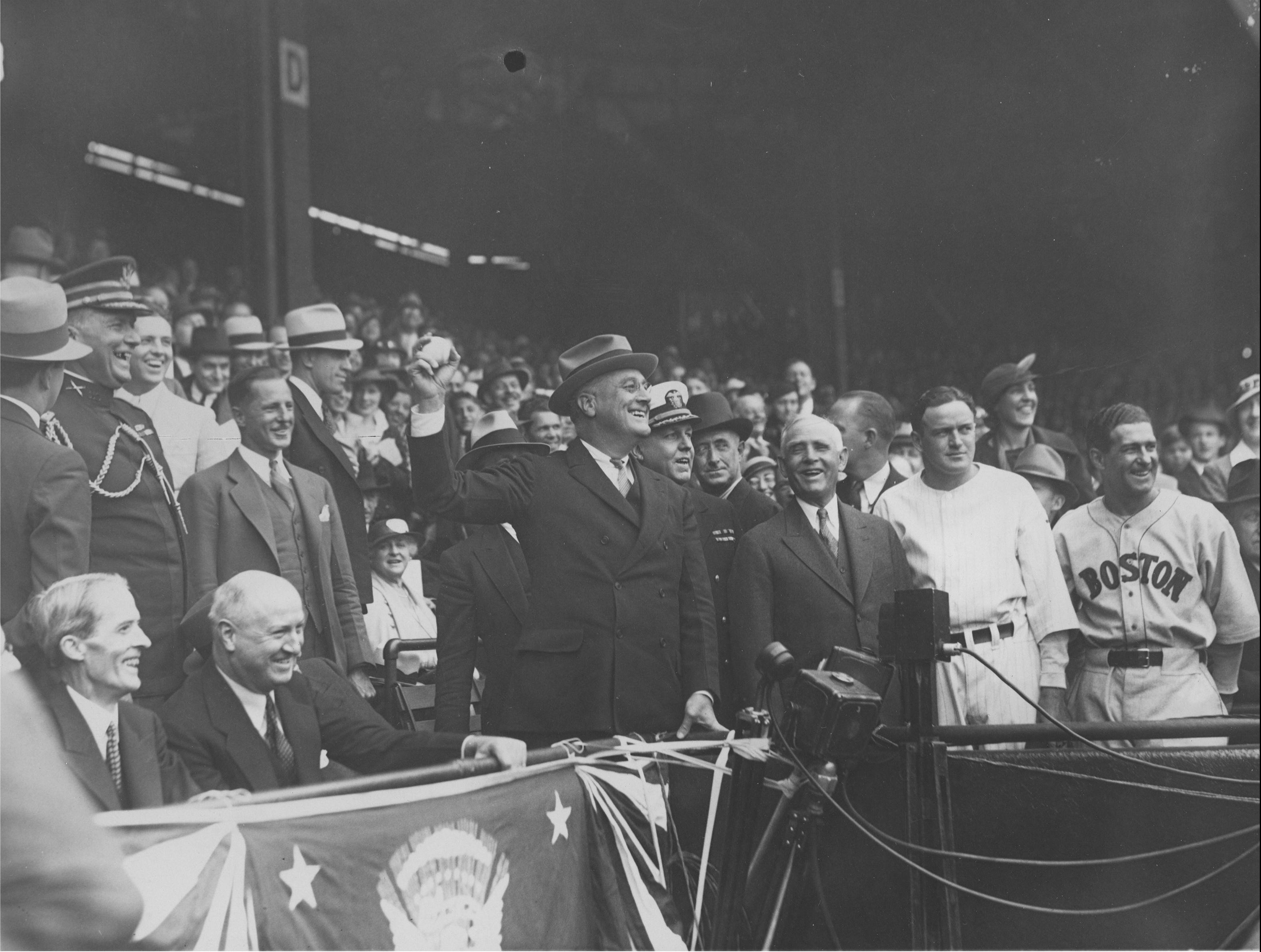 President Franklin D. Roosevelt throws out the first pitch at a 1934 baseball game between the Washington Senators and Boston Red Sox. (Source: National Archives)