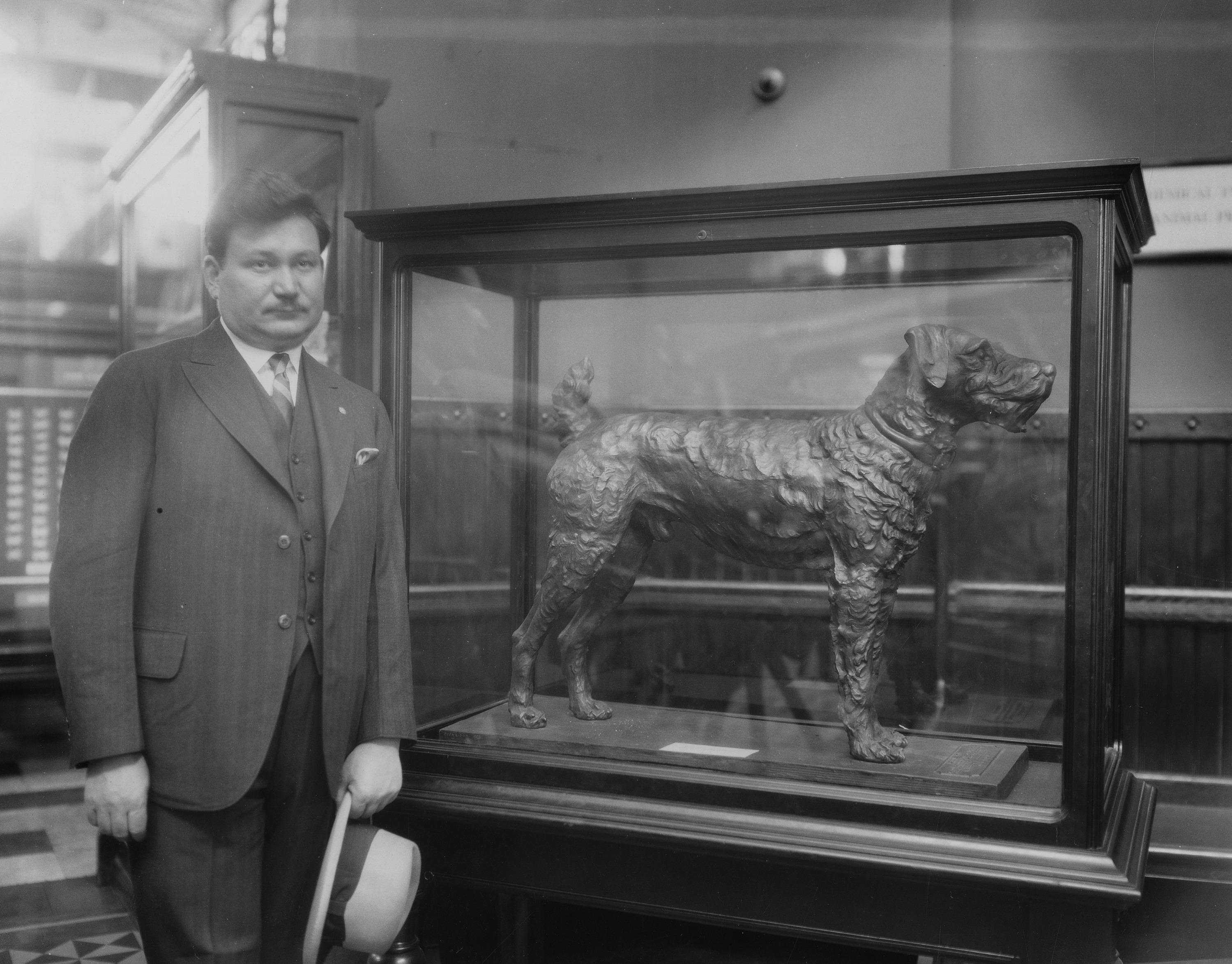 Newsboys donated pennies to make a bronze statue of "Laddie Boy," which stood on display at the Smithsonian for many years. According to the Smithsonian's archives, the inscription reads "Laddie Boy, cast from the pennies of newsboys throughout the nation in memory of Warren Gamaliel Harding, their friend".  (Photo credit: Smithsonian Institution Archives, SIA2009-0445 and 811)