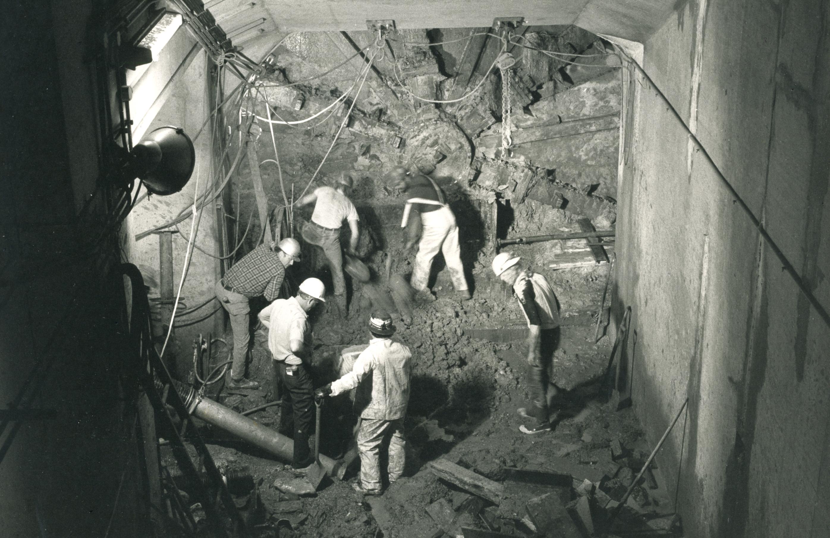 Six workmen dig Metro Green Line tunnel. (Credit: Larry Levine, Metro Photograph Collection, DC Public Library)