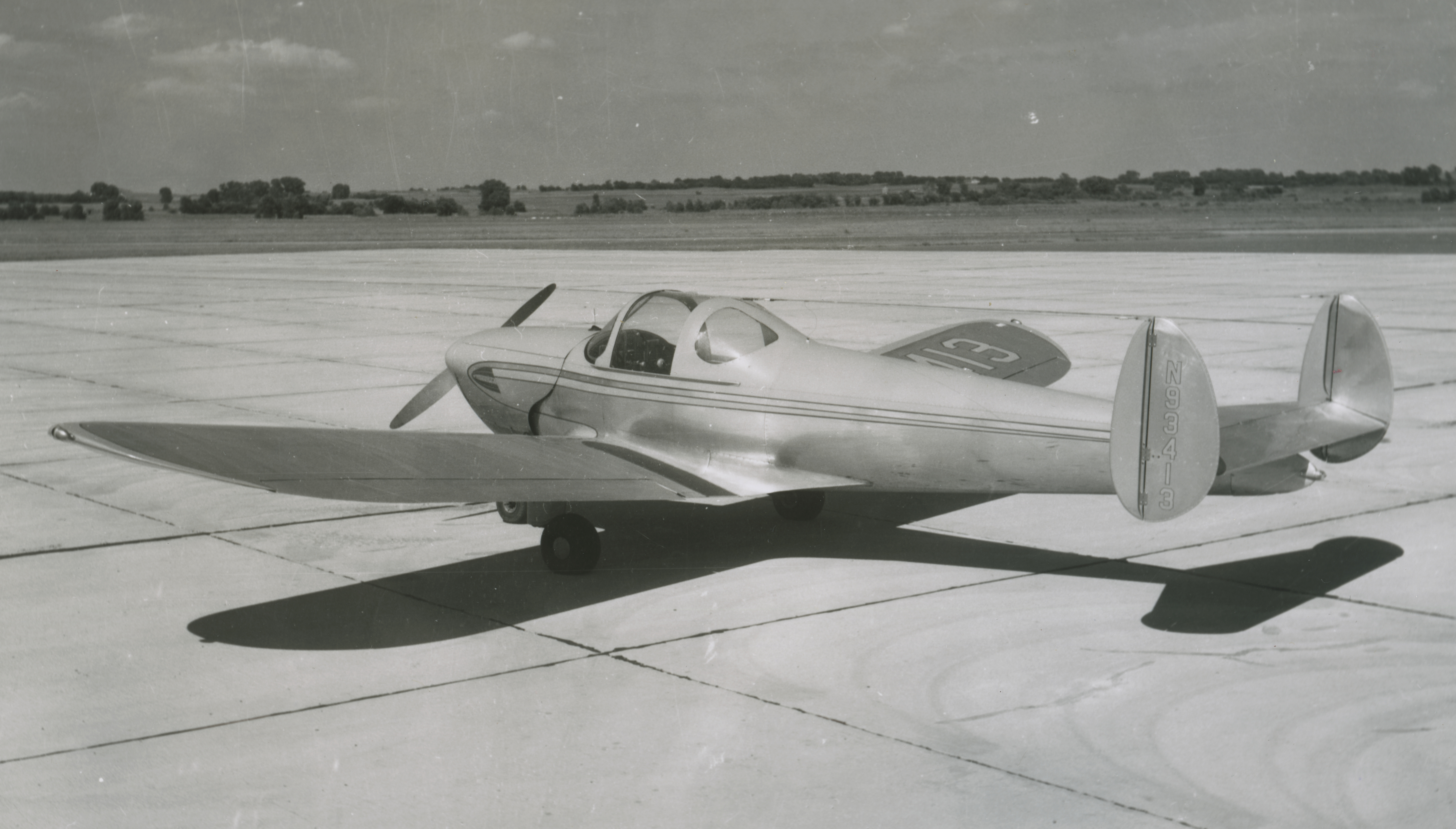 Small airplane sitting on runway.