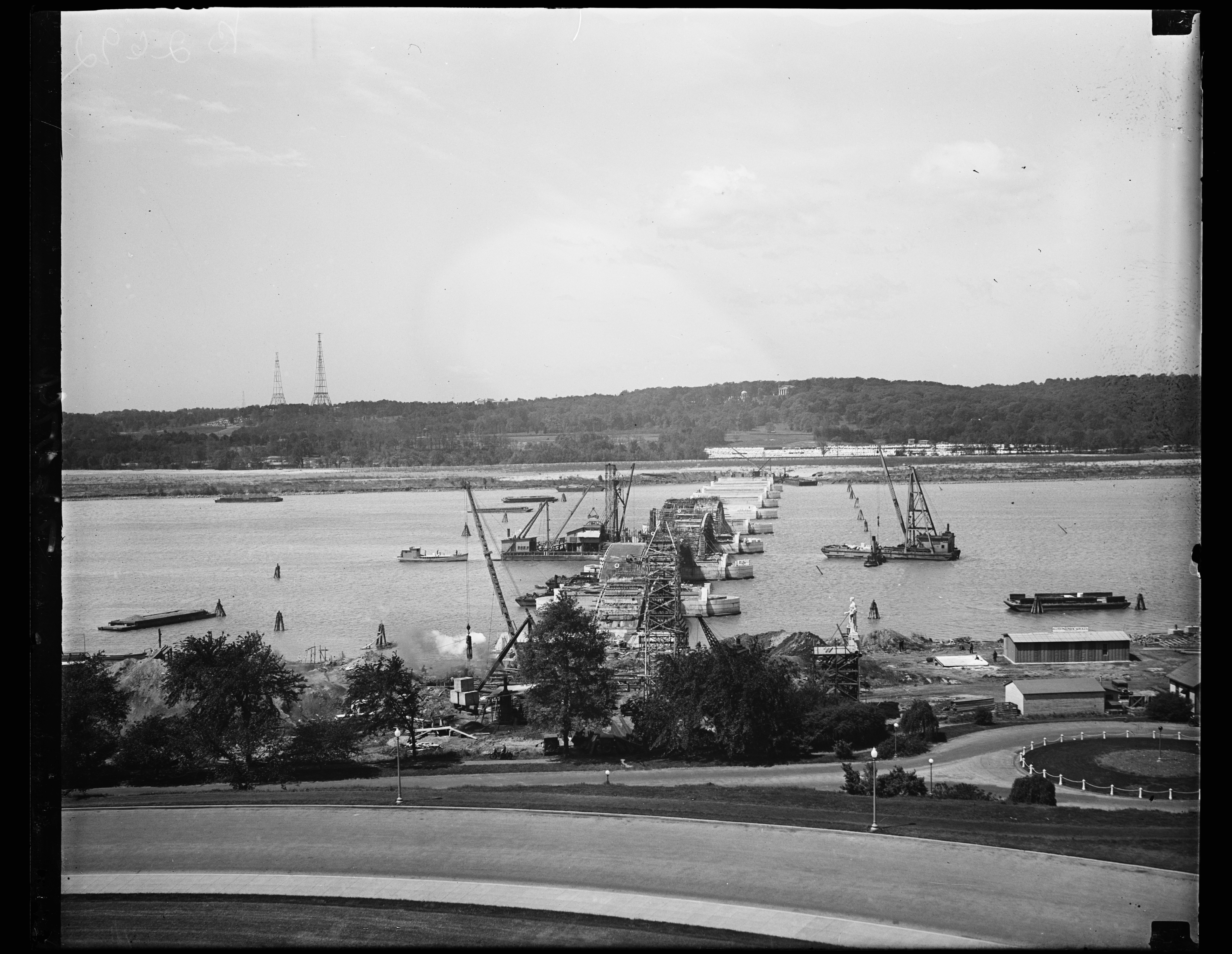 Image of a new bridge to connect Washington with Arlington National Cemetery, with the Arlington towers visible in the background to the left.