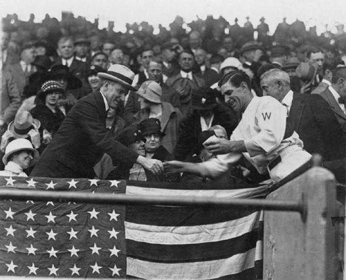 Washington Senators player-manager Bucky Harris presents a ball to Presisdent Calvin Coolidge at the 1924 World Series. Image Credit: Library of Congress