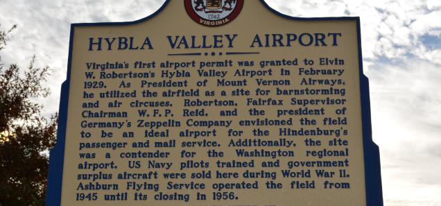 Hybla Valley Airport historical marker (Credit: Dwayne Moyers - Flickrhttps://www.flickr.com/photos/moyersteam/10943825416/sizes/o/, CC BY 2.0, https://commons.wikimedia.org/w/index.php?curid=49911709) Hybla Valley Airport historical marker (Credit: Wikipedia)